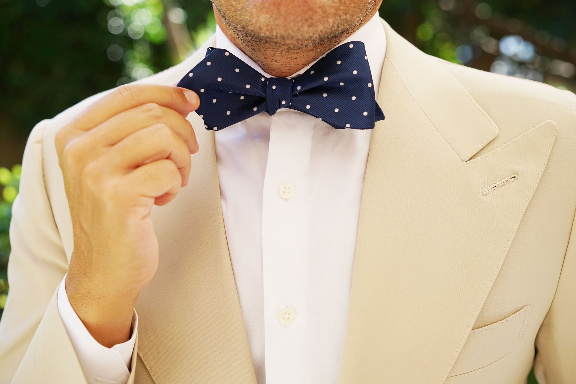 The OTAA Navy Blue with White Polka Dots Self Tie Diamond Tip Bow Tie