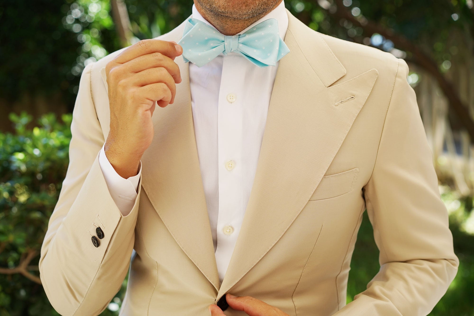 The OTAA Mint Blue with White Polka Dots Self Tie Diamond Tip Bow Tie