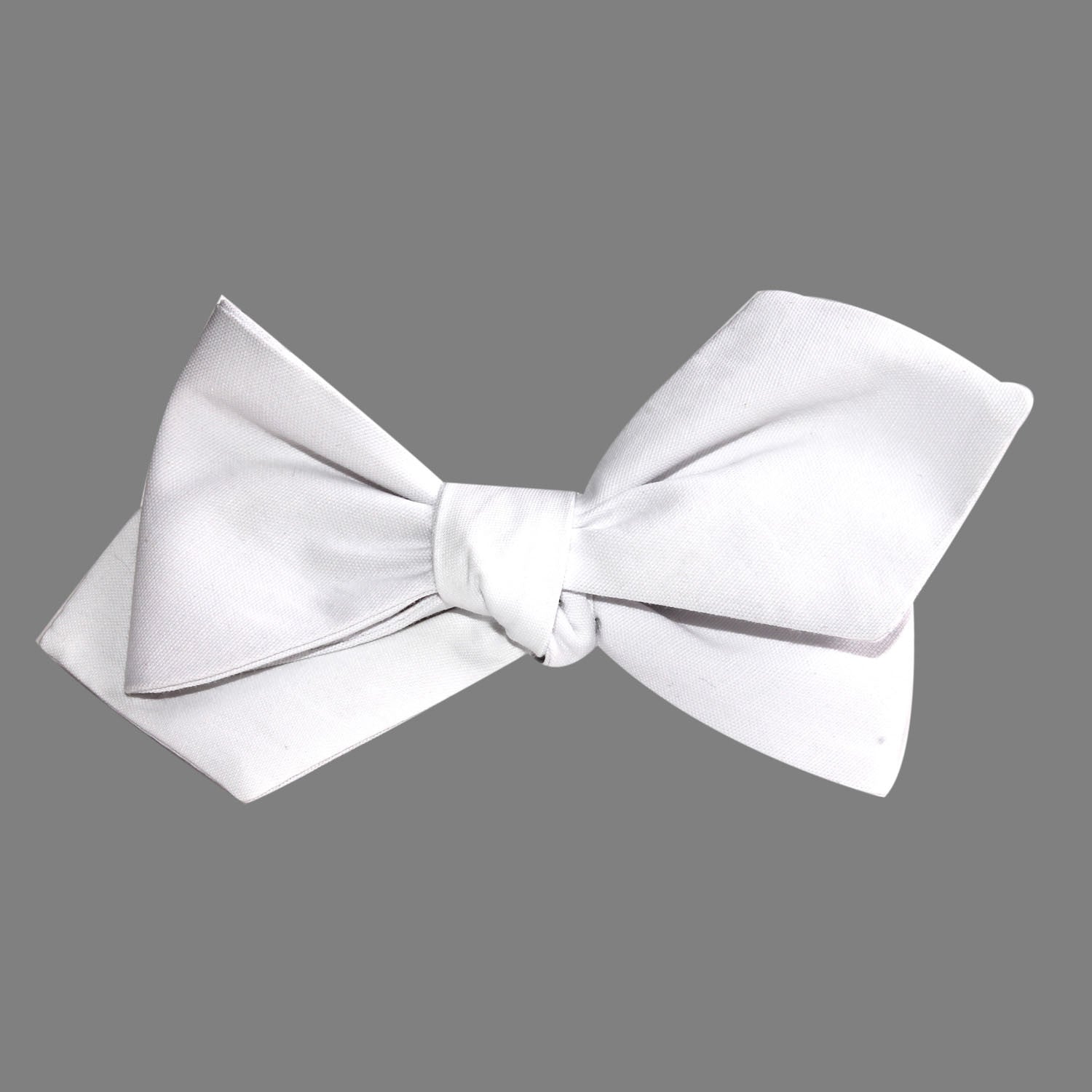 The OTAA White Cotton Self Tie Diamond Tip Bow Tie